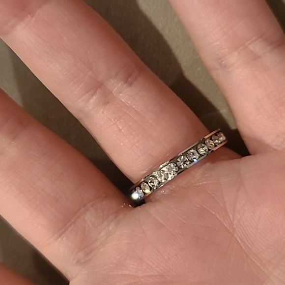 Eternity style cubic zirconia stainless steel channel set stones ring - Picture 2 of 7